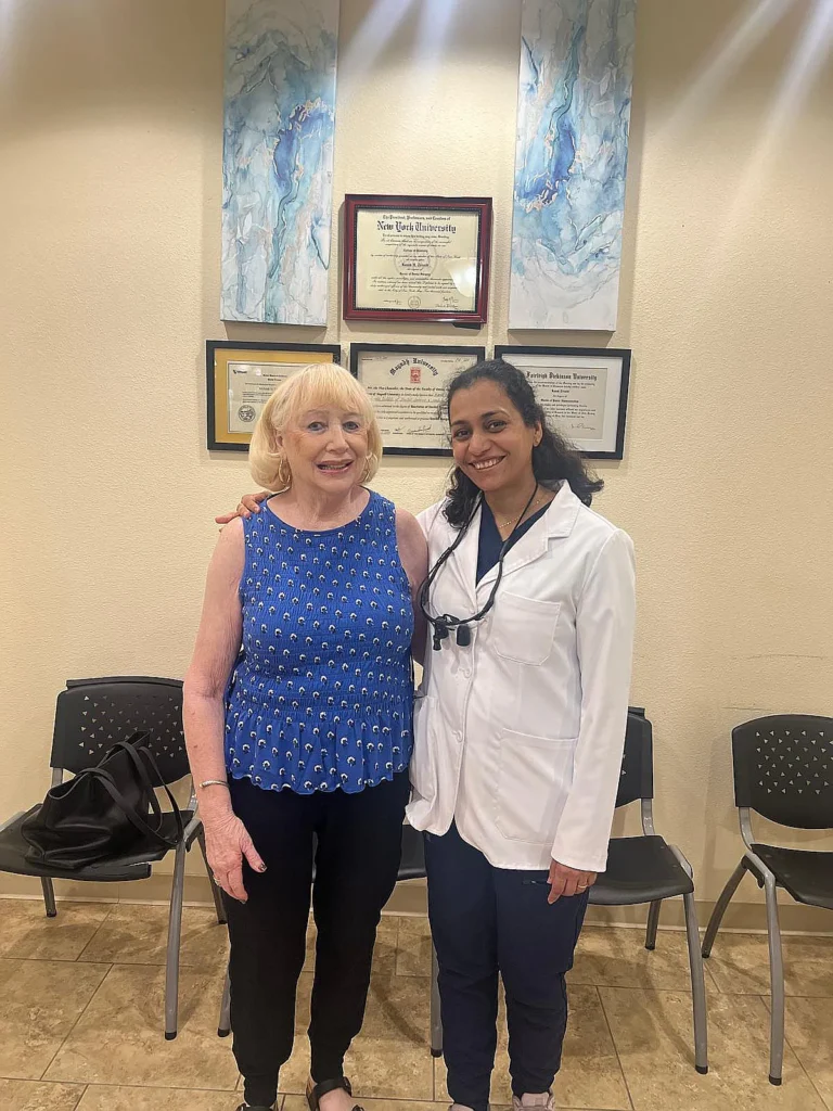 Dr. Kanak Trivedi with a patient in the waiting room