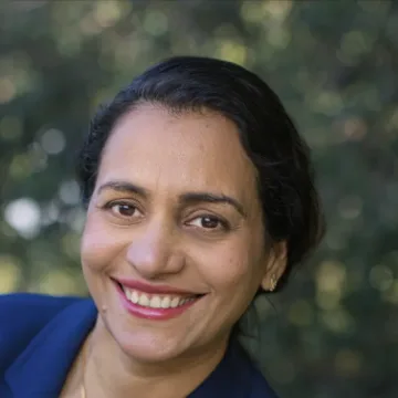 Headshot of Dr. Kanak Trivedi smiling outdoors